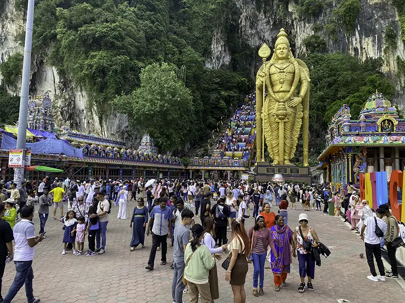 Visiting Batu Caves at the right time is important during Batu Caves tours to avoid crowds