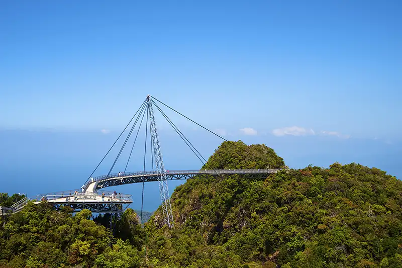 Langkawi Sky Bridge surrounded by lush greenery, a popular attraction for short trips in Malaysia.