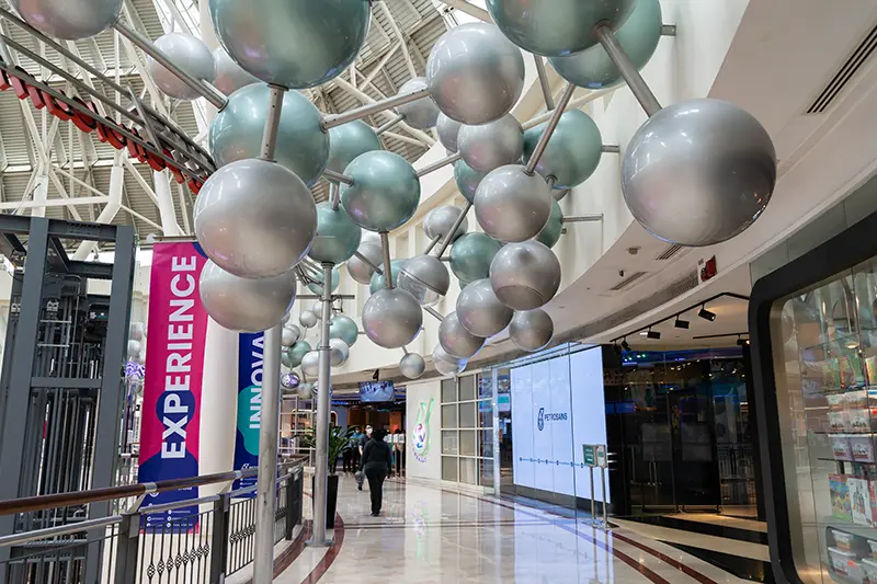 Entrance to Petrosains Science Discovery Centre at Petronas Twin Towers in Kuala Lumpur, featuring interactive exhibits and educational experiences."
